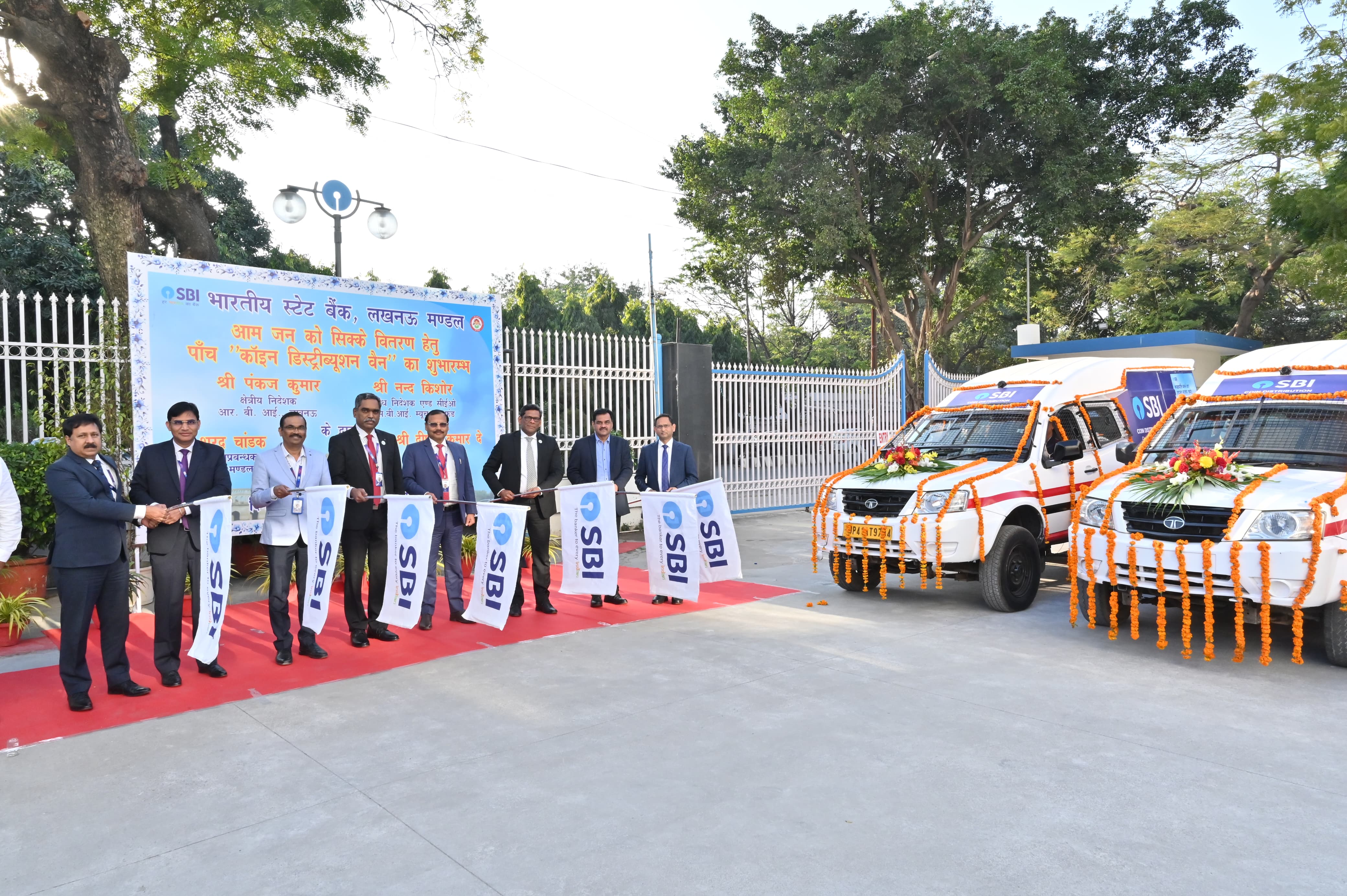 five coin distribution vans  were flagged off by Pankaj Kumar, Regional Director, RBI