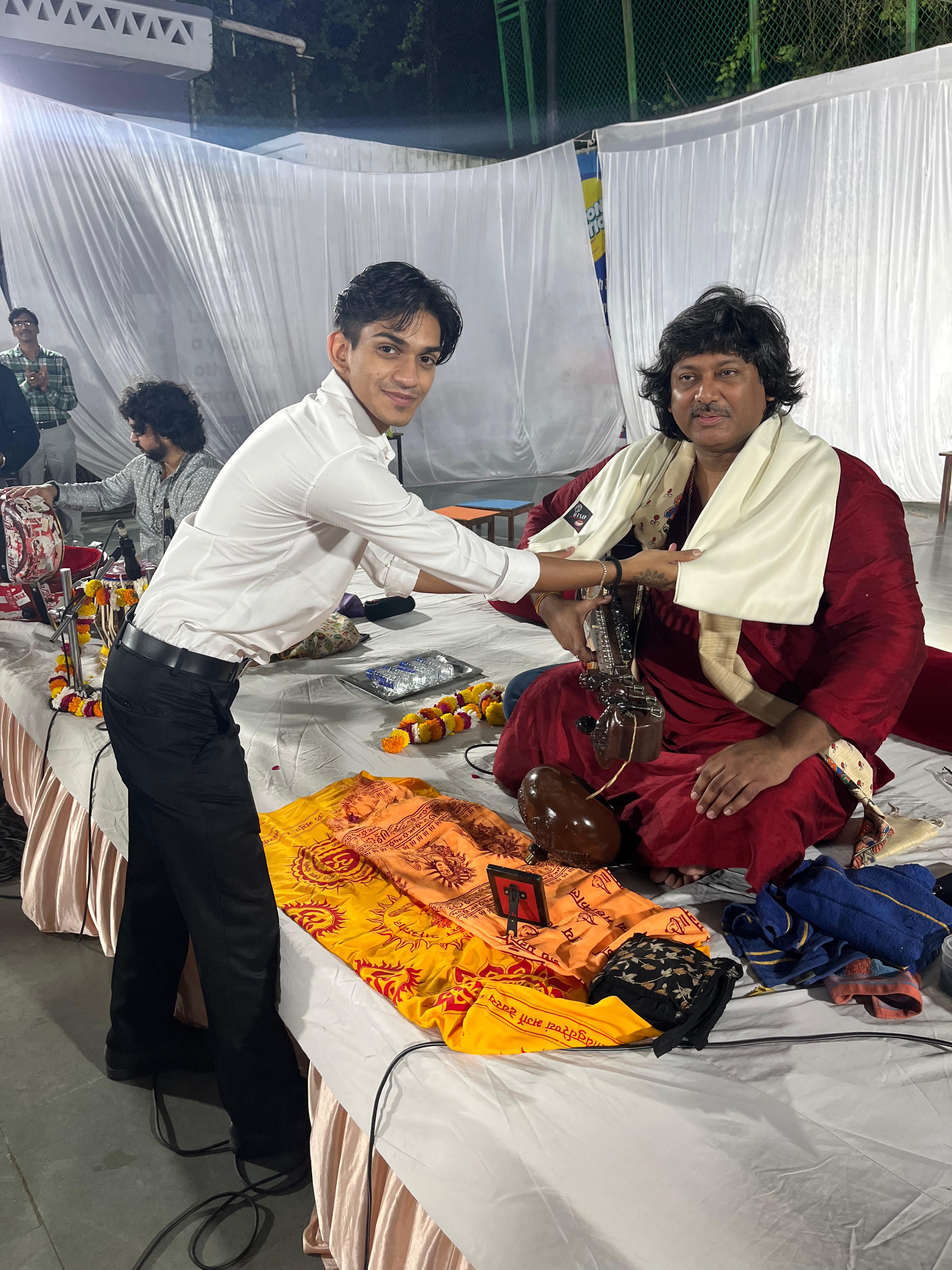 Mr. Robert Gandhi, MD of City International School honouring Pandit Abhishek Mishra.